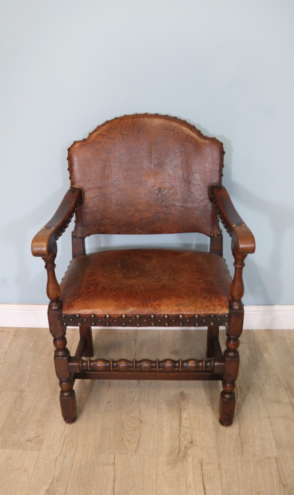 A lovely set of six early 20th Cromwellian style industrial looking dining chairs. View IX