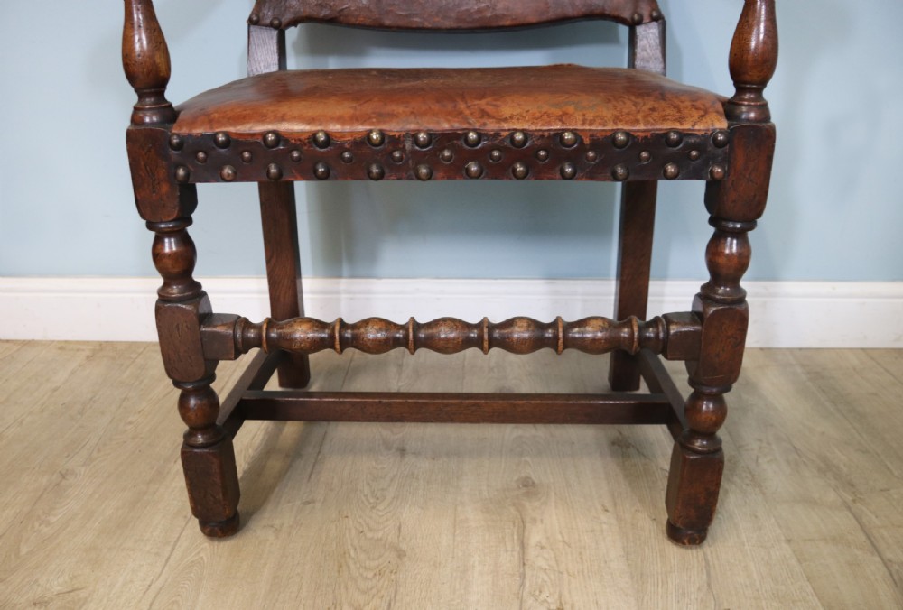 A lovely set of six early 20th Cromwellian style industrial looking dining chairs. View XVII