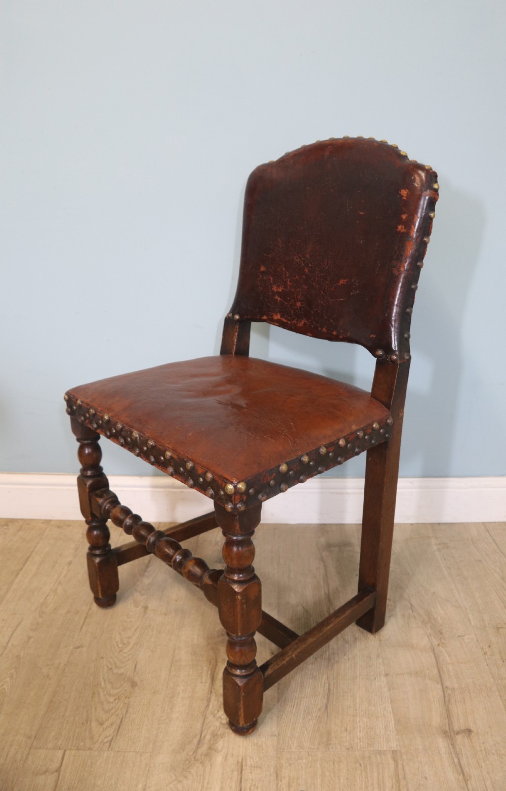 A lovely set of six early 20th Cromwellian style industrial looking dining chairs. View XX
