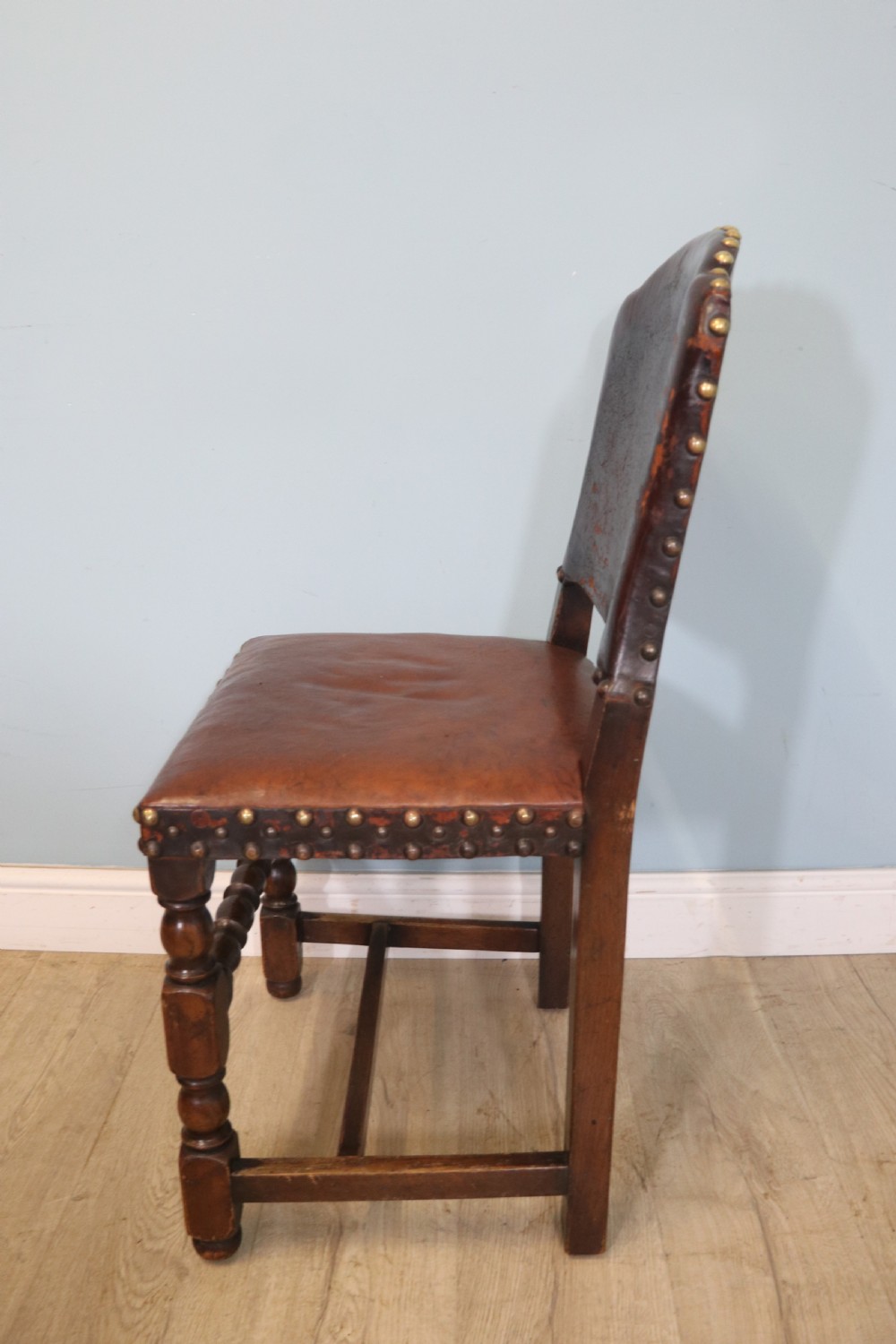 A lovely set of six early 20th Cromwellian style industrial looking dining chairs. View XXI