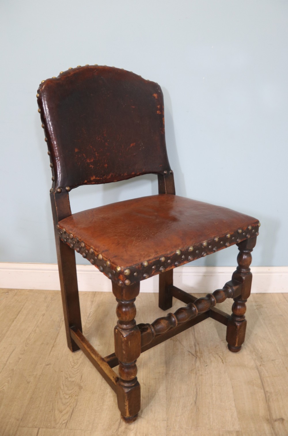 A lovely set of six early 20th Cromwellian style industrial looking dining chairs. View XXVI