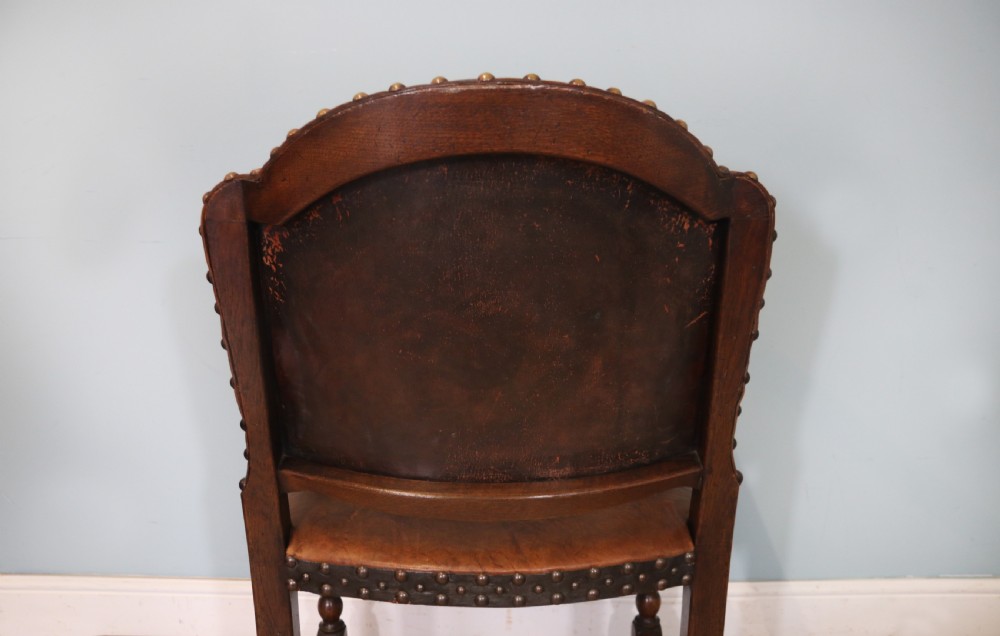 A lovely set of six early 20th Cromwellian style industrial looking dining chairs. View XXX