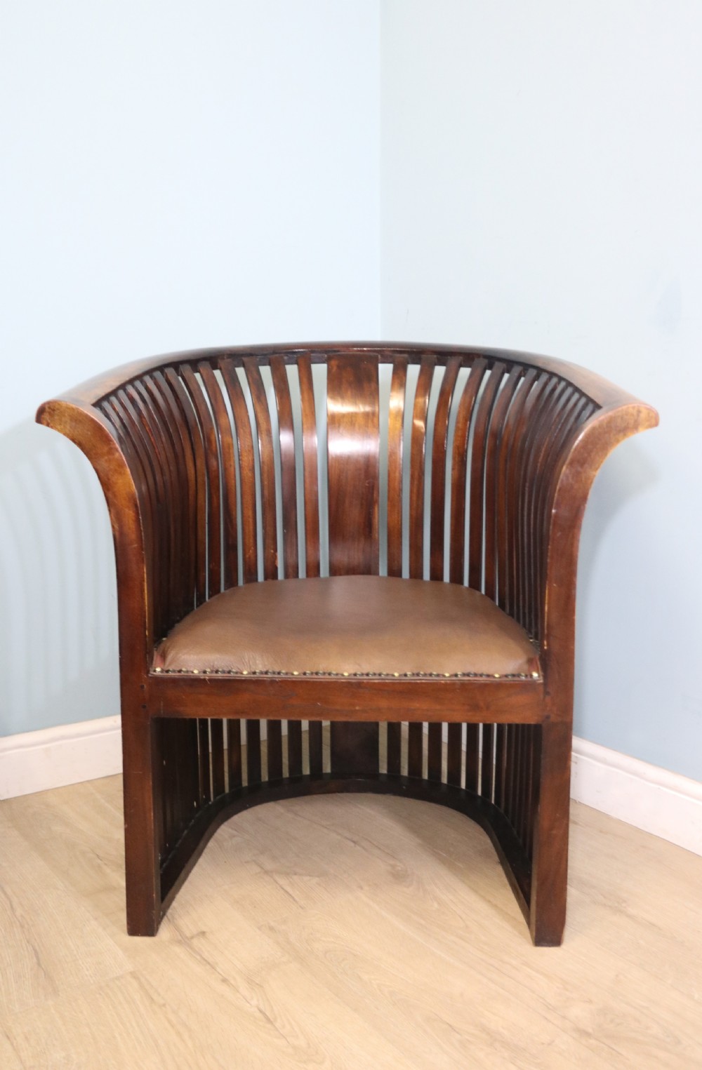 An early 20th century hardwood framed chair with curved back View II