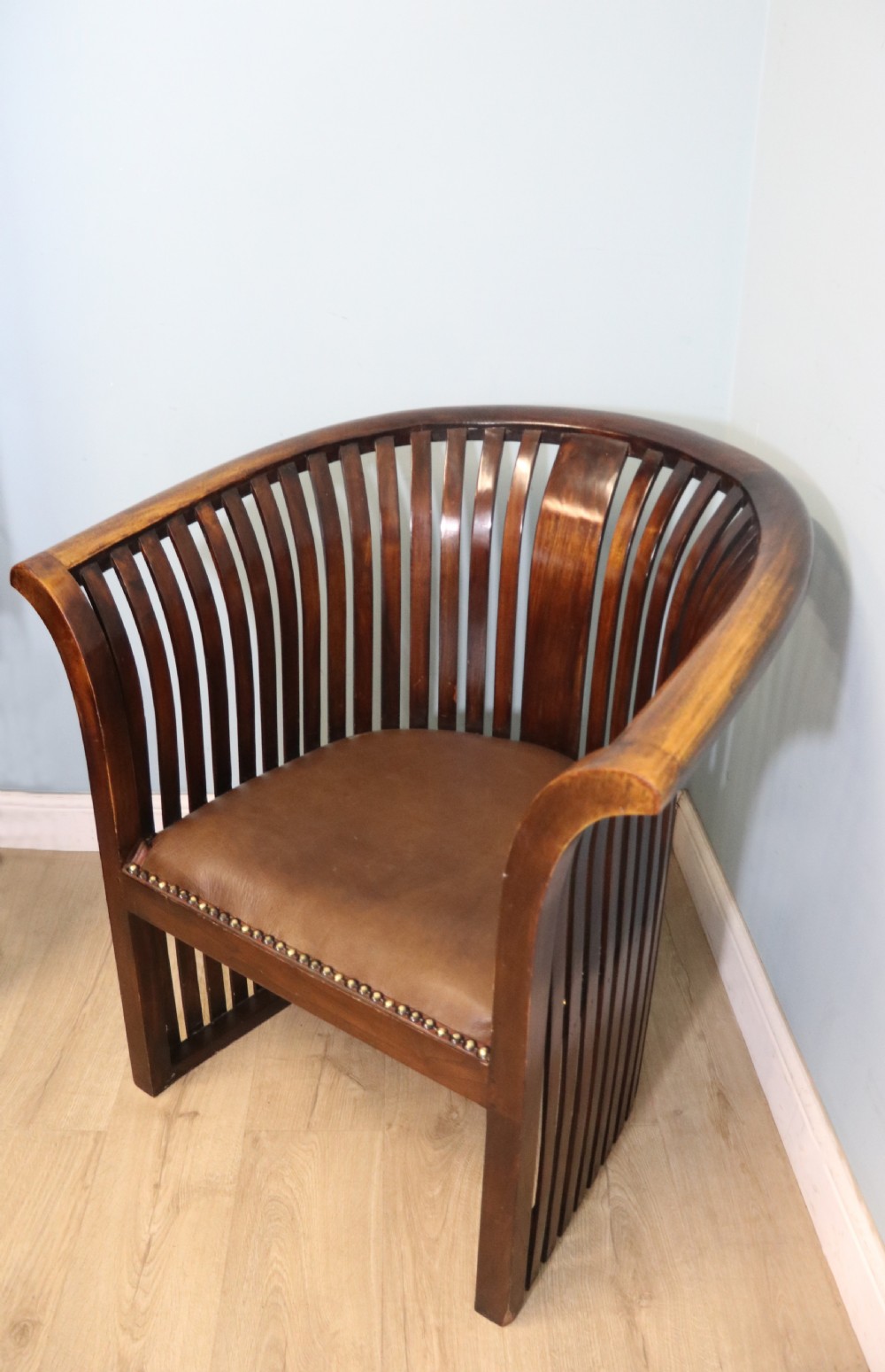 An early 20th century hardwood framed chair with curved back View III