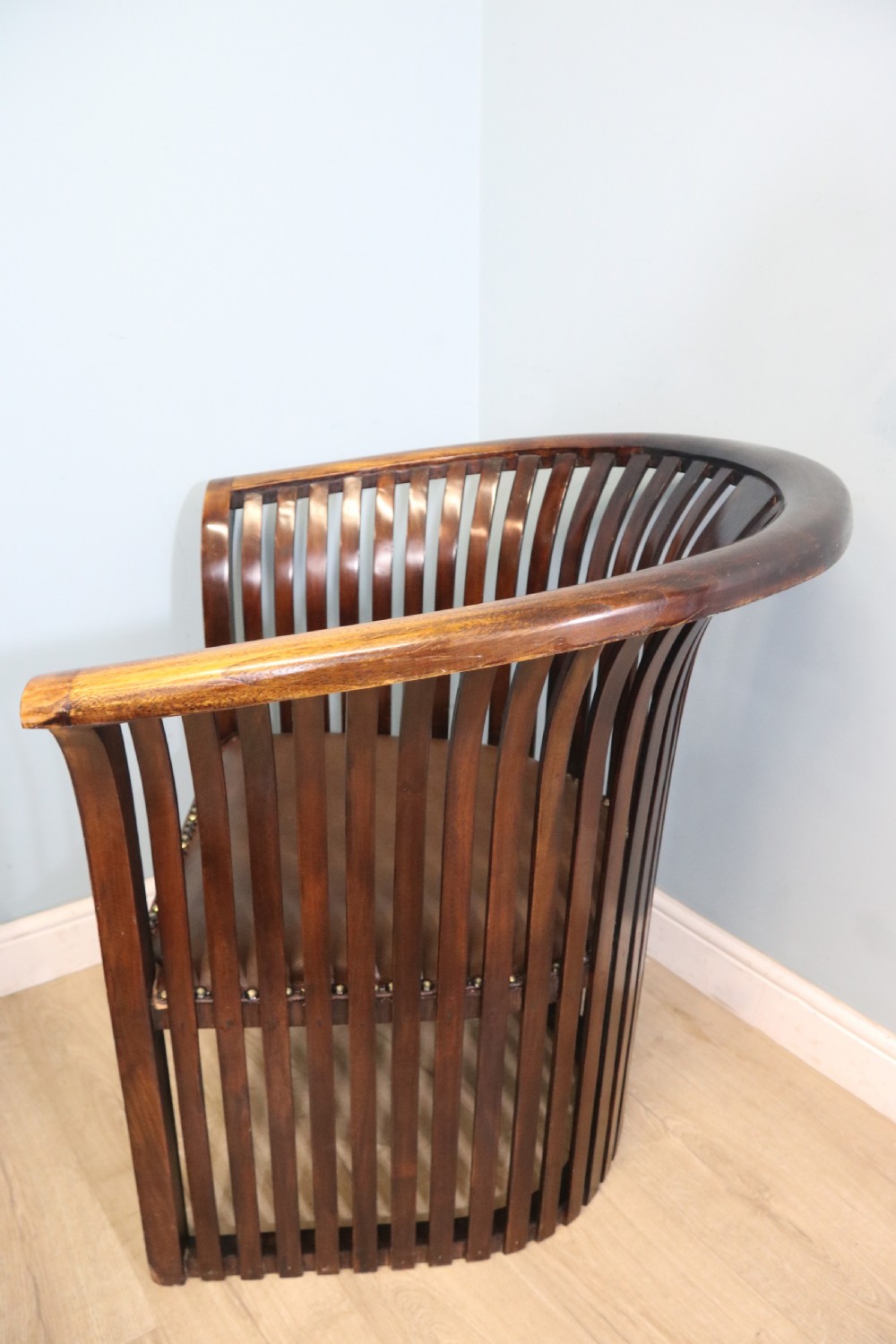 An early 20th century hardwood framed chair with curved back View VI