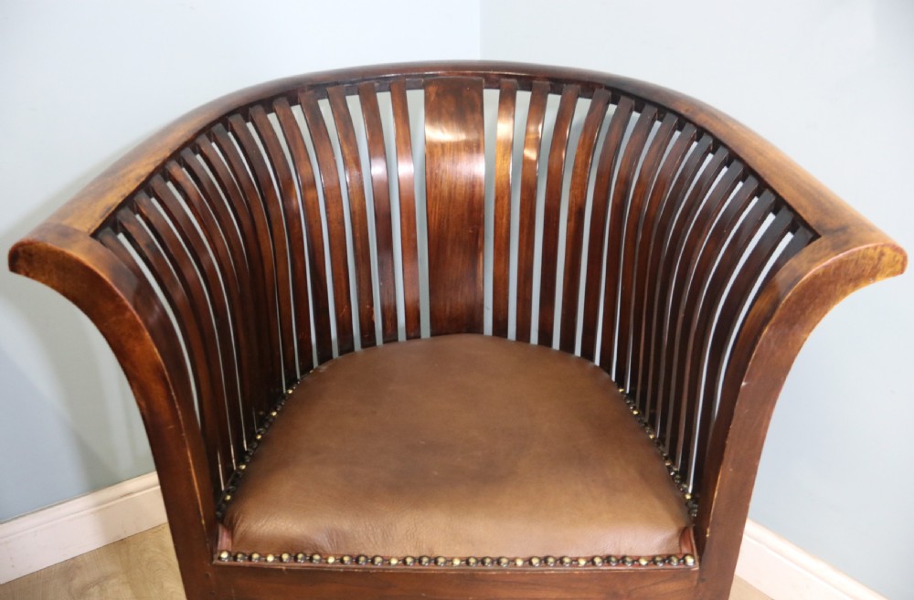 An early 20th century hardwood framed chair with curved back View XIV