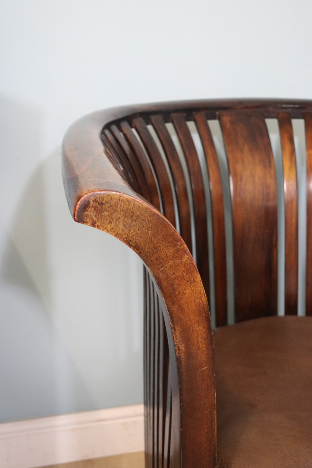An early 20th century hardwood framed chair with curved back View XV