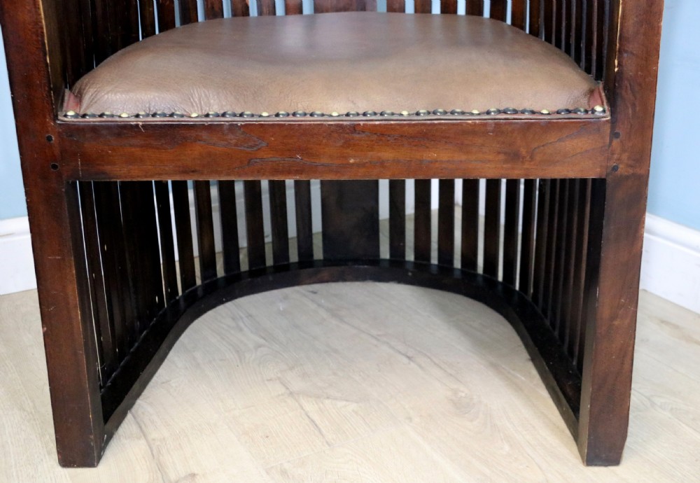 An early 20th century hardwood framed chair with curved back View XX