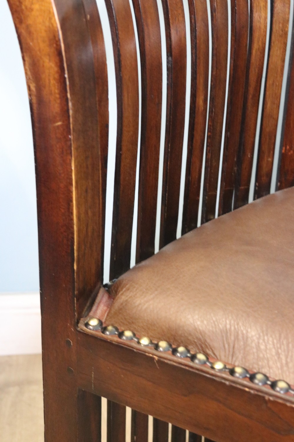 An early 20th century hardwood framed chair with curved back View XXI