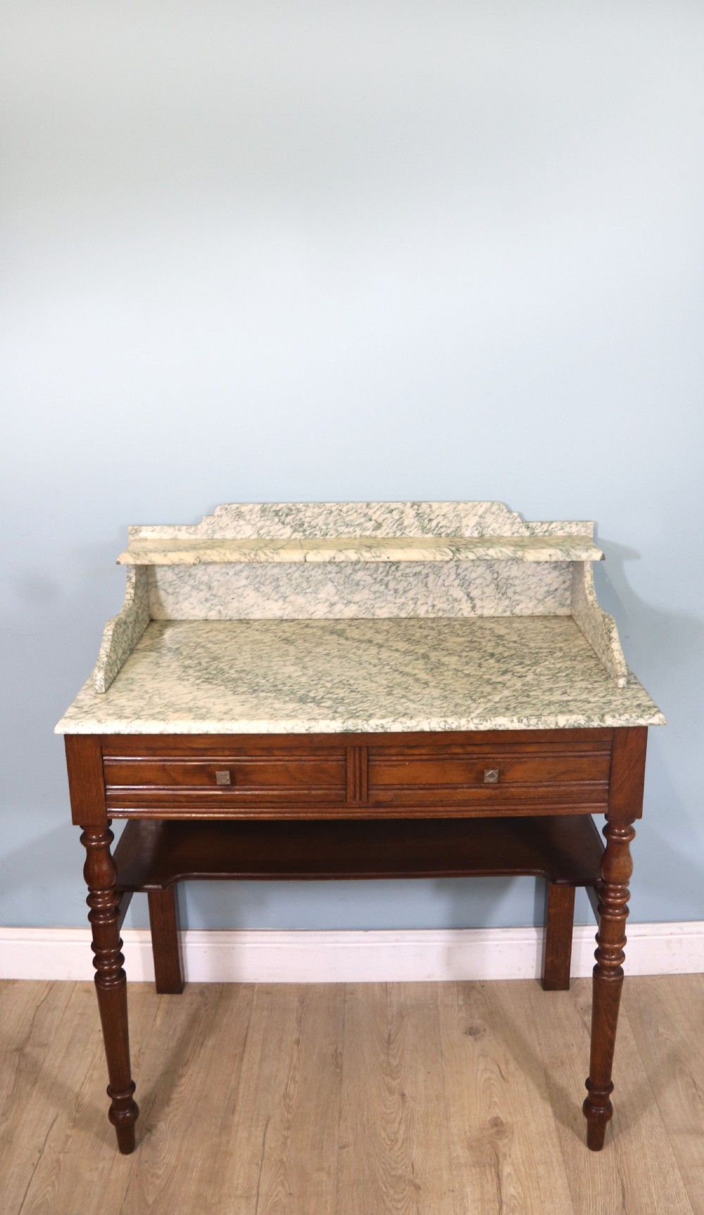 Late Victorian oak and walnut framed marble top washstand  View III