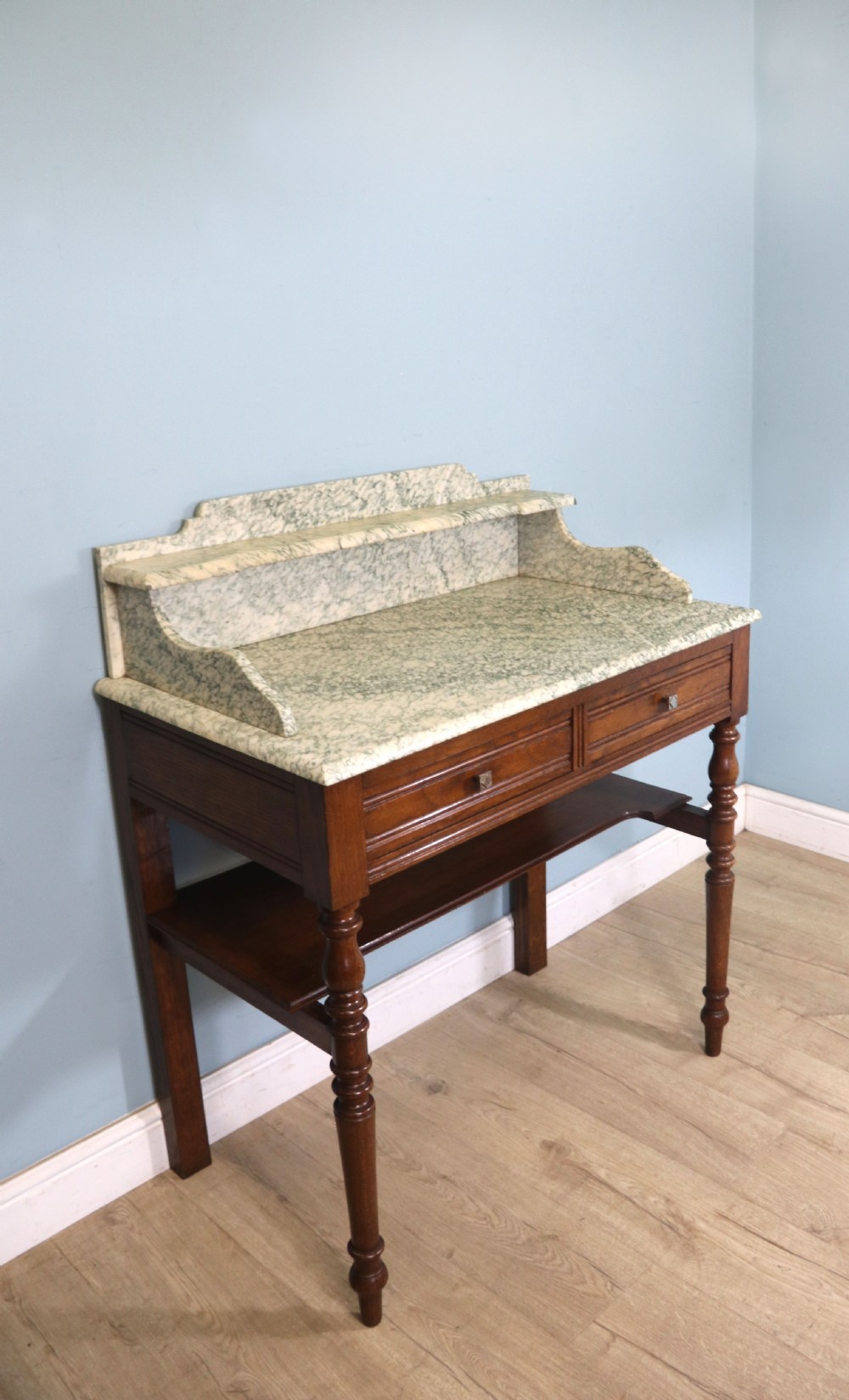 Late Victorian oak and walnut framed marble top washstand  View V