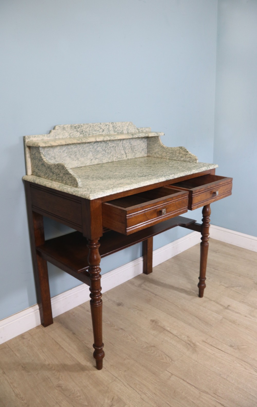 Late Victorian oak and walnut framed marble top washstand  View VI