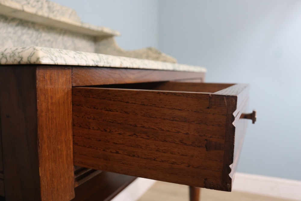 Late Victorian oak and walnut framed marble top washstand  View XIV