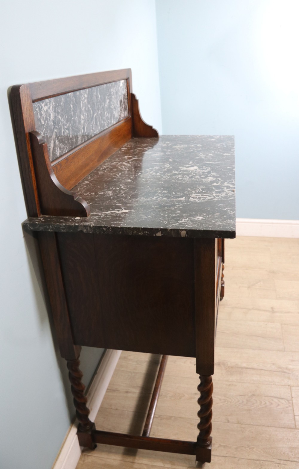 A lovely early 20th Century marble topped oak washstand. View IV