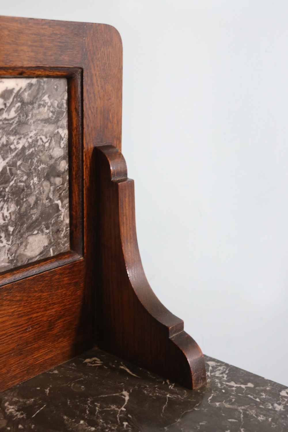 A lovely early 20th Century marble topped oak washstand. View IX