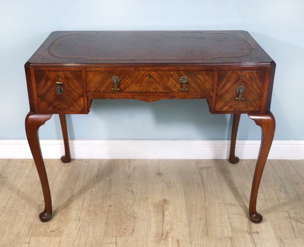 Early 20th Century walnut veneered writing table