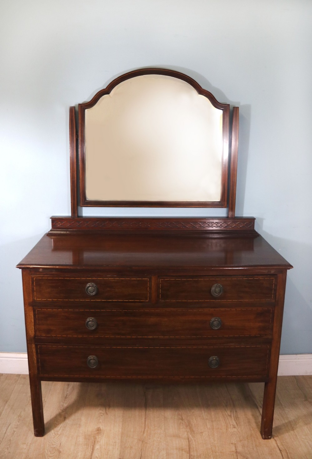 Edwardian mahogany and line inlaid dressing chest.