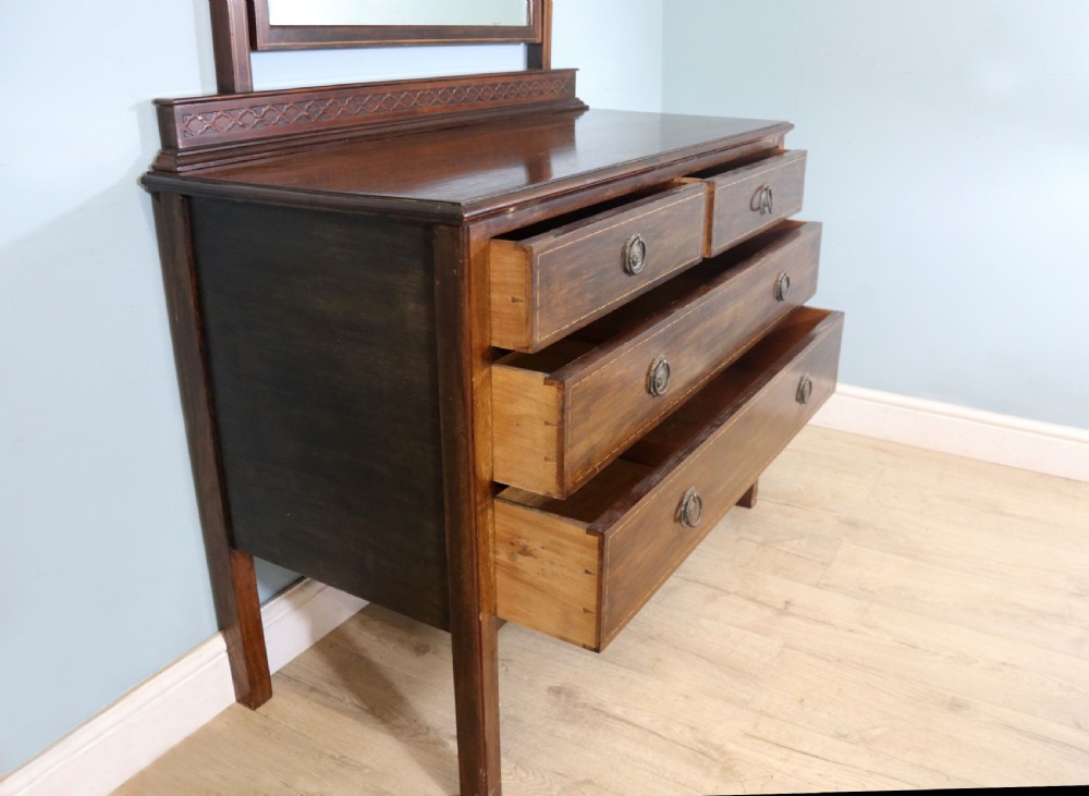Edwardian mahogany and line inlaid dressing chest. View V