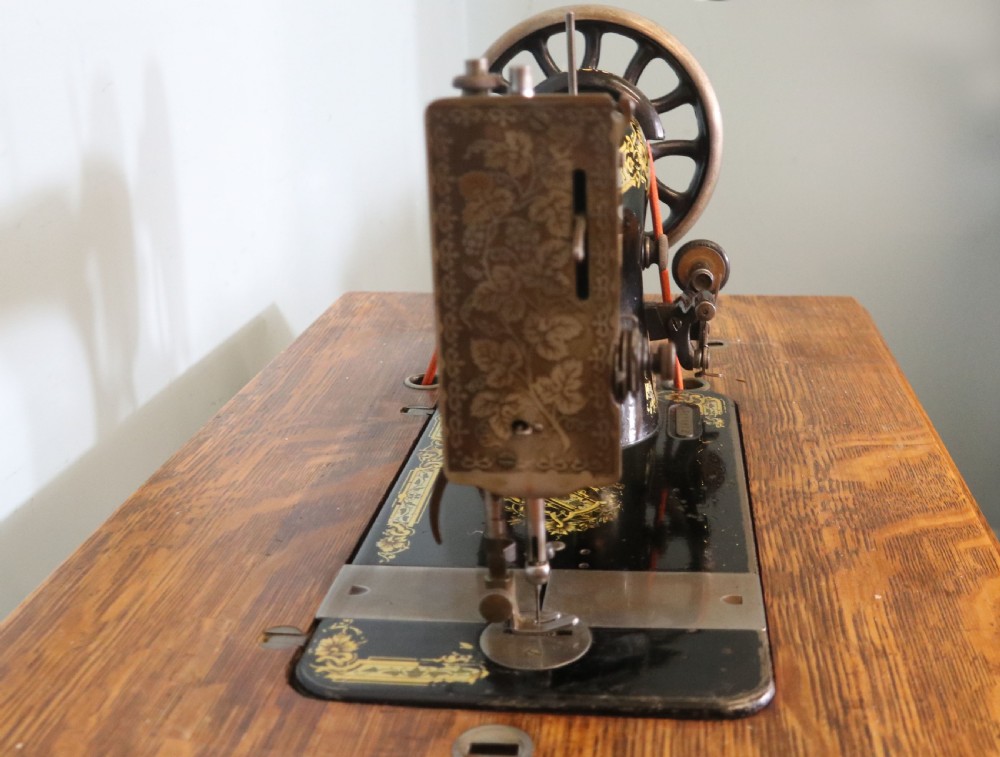 Vintage treadle Singer machine View XII