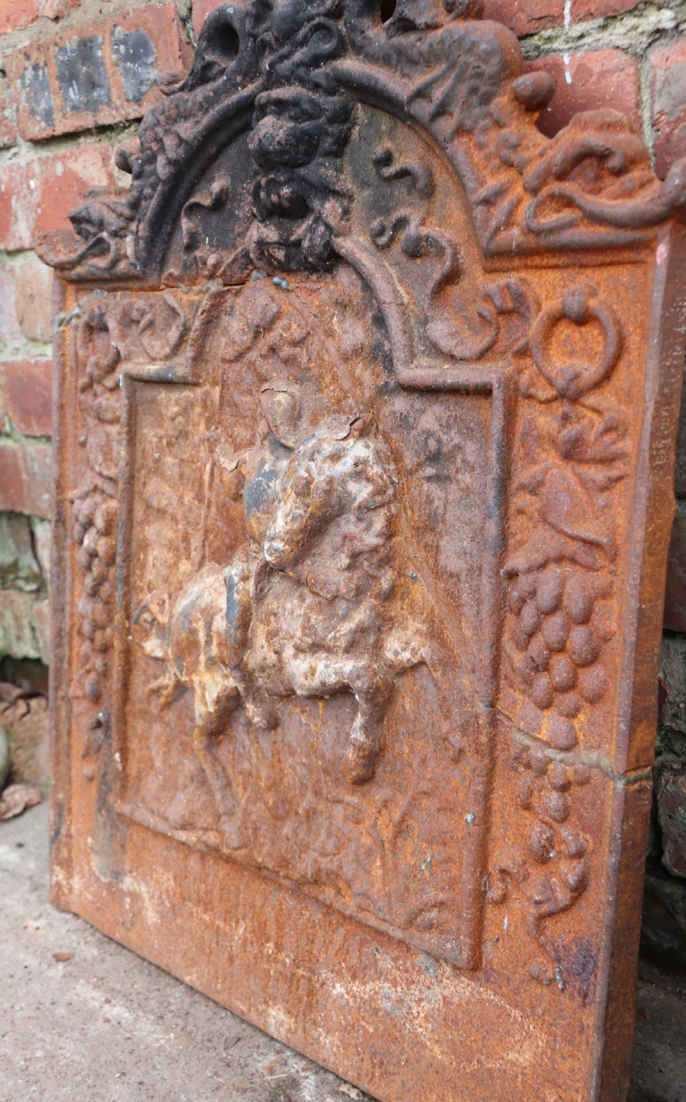 A quality cast iron arch top fireback View II