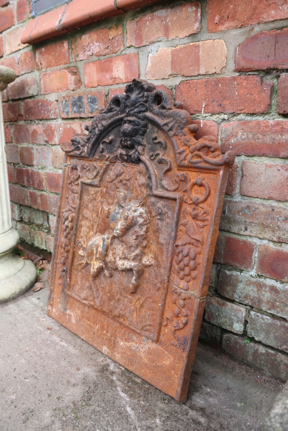 A quality cast iron arch top fireback View III