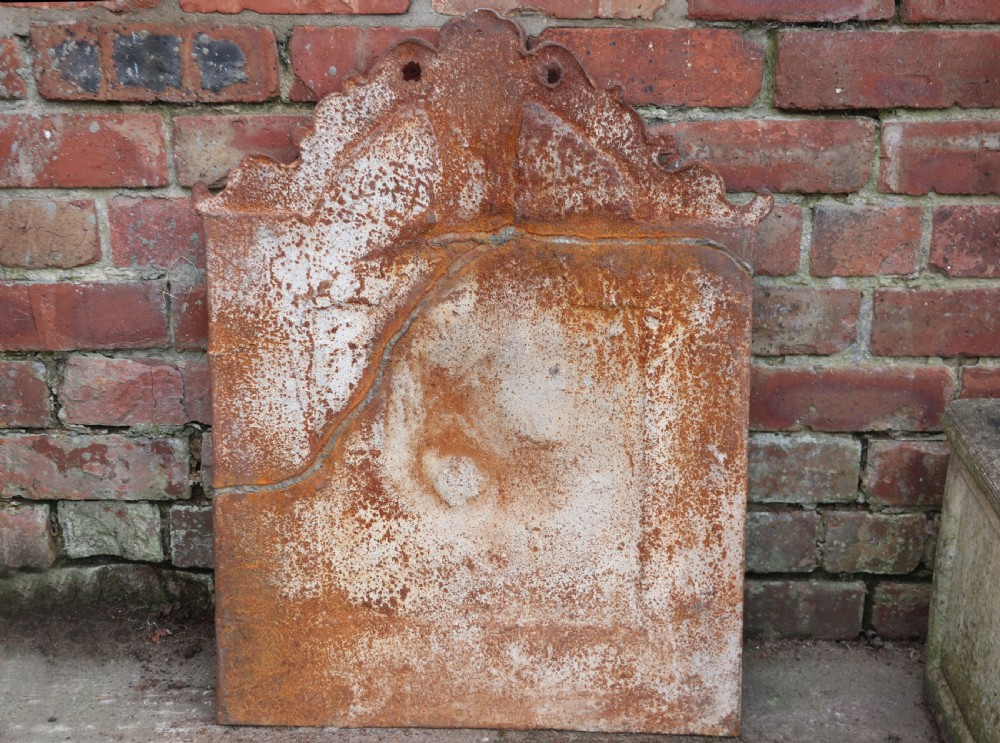 A quality cast iron arch top fireback View IV