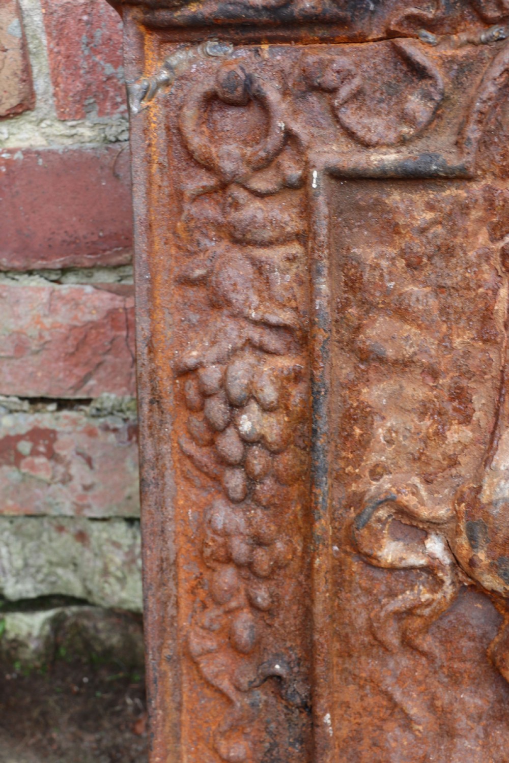 A quality cast iron arch top fireback View VIII