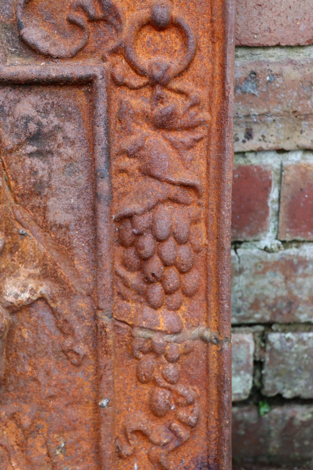 A quality cast iron arch top fireback View X