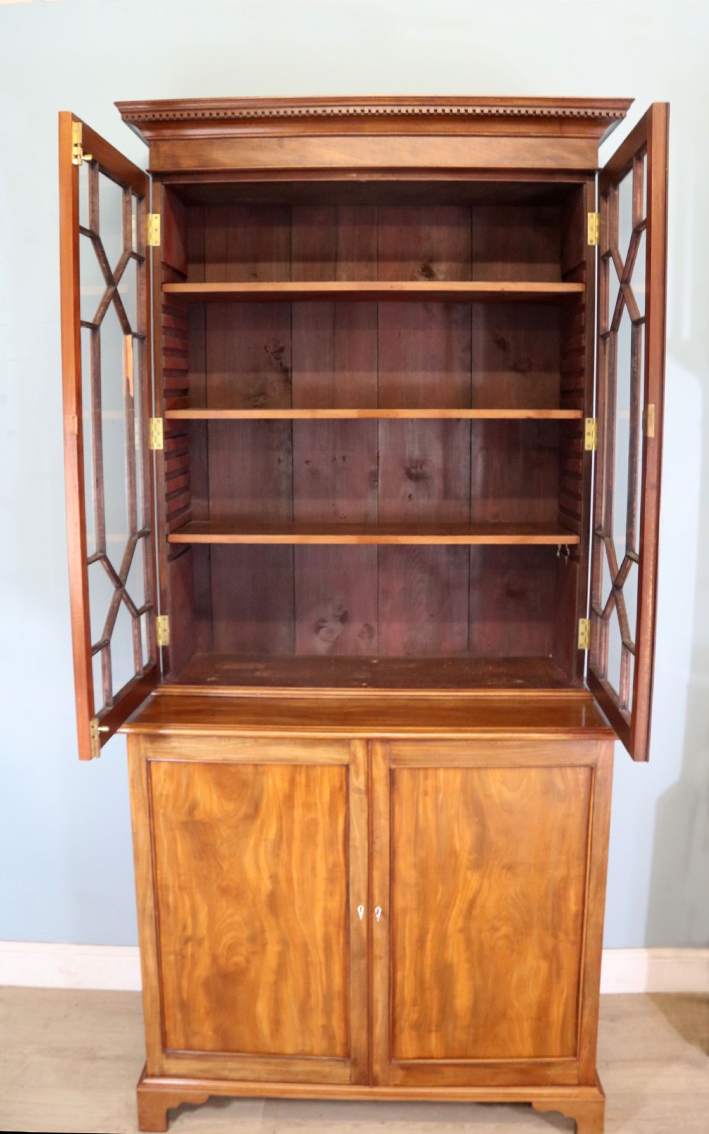 A superb example of a quality Georgian mahogany bookcase cabinet.  View III