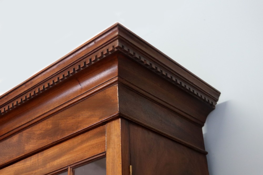 A superb example of a quality Georgian mahogany bookcase cabinet.  View VI