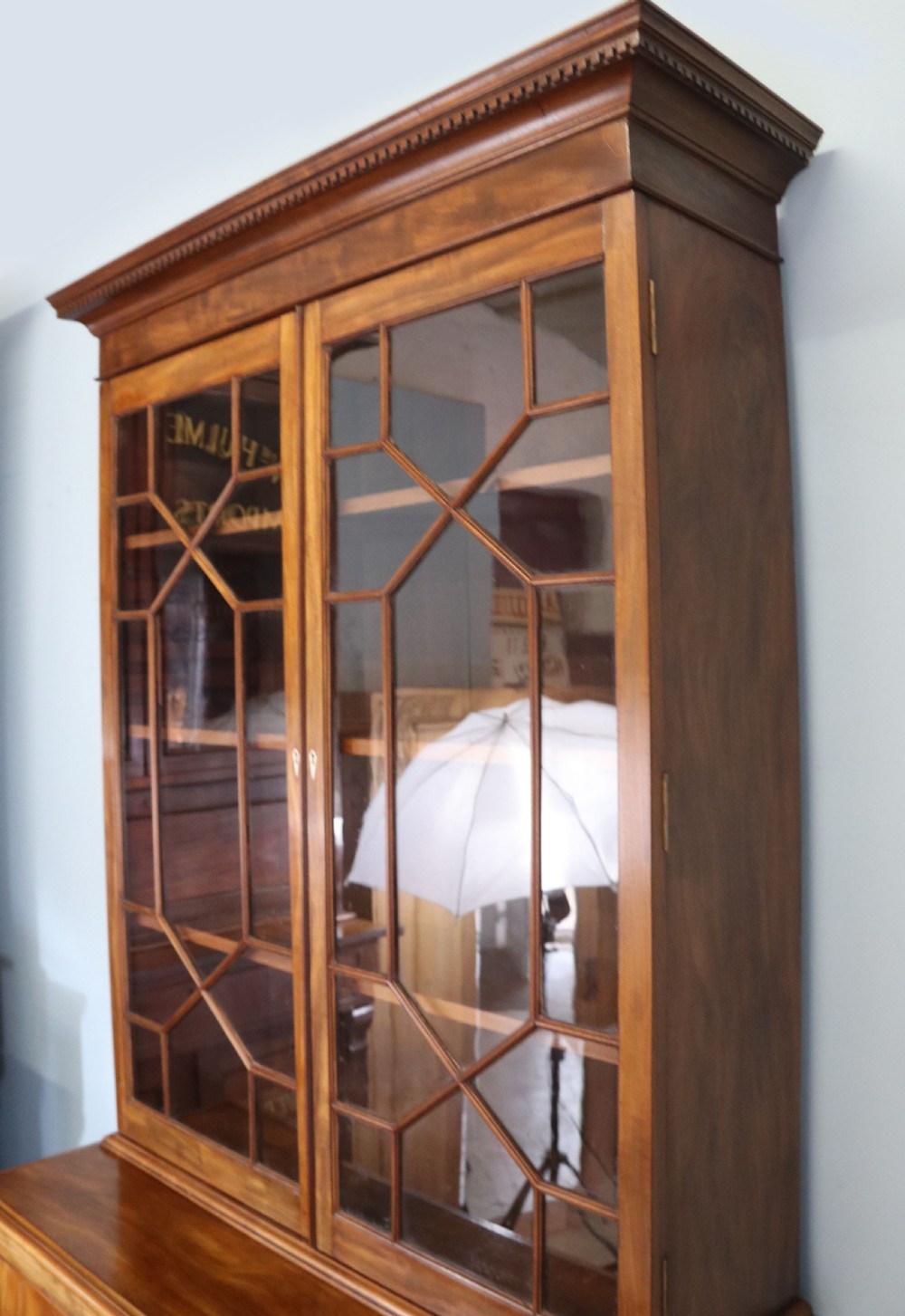 A superb example of a quality Georgian mahogany bookcase cabinet.  View VII