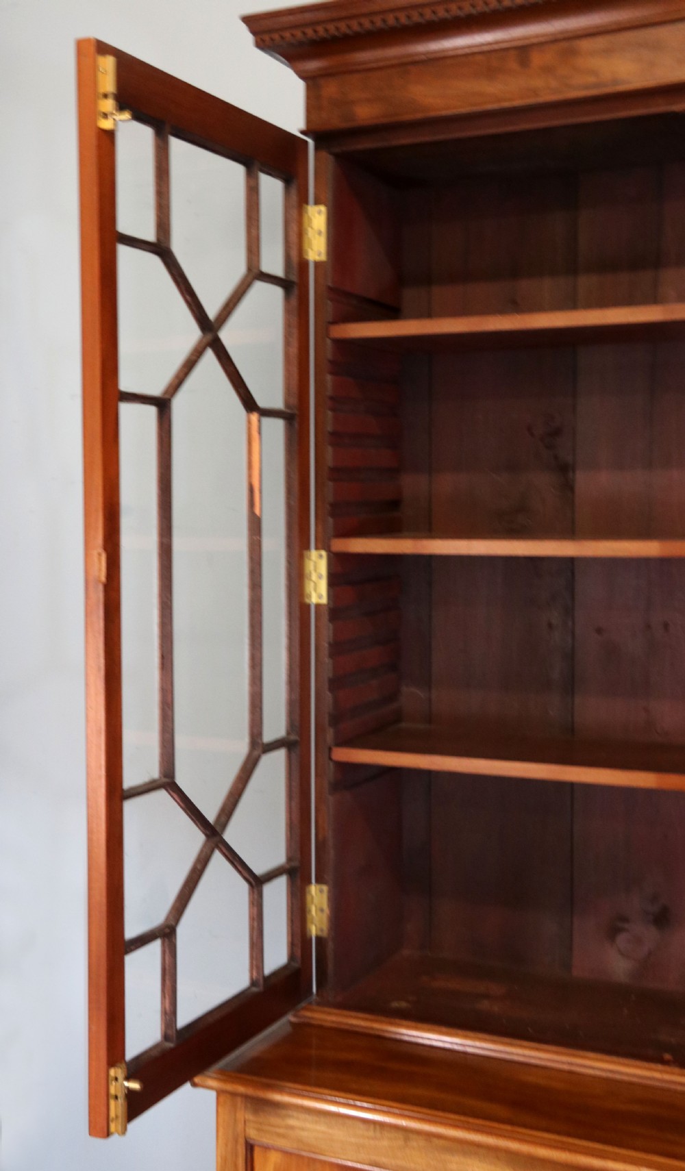 A superb example of a quality Georgian mahogany bookcase cabinet.  View X