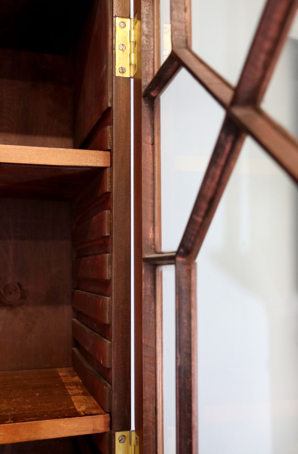 A superb example of a quality Georgian mahogany bookcase cabinet.  View XII