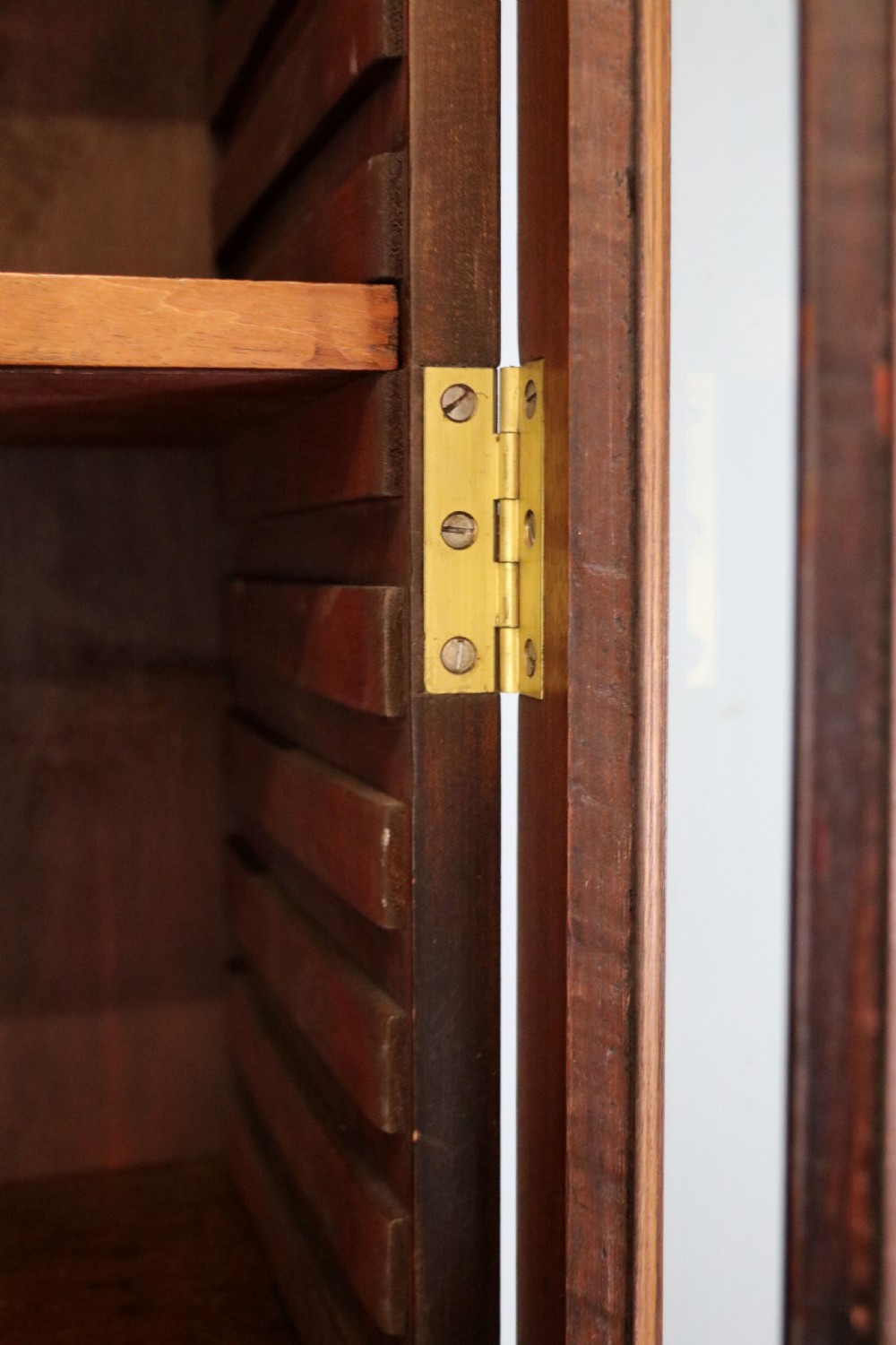 A superb example of a quality Georgian mahogany bookcase cabinet.  View XIII