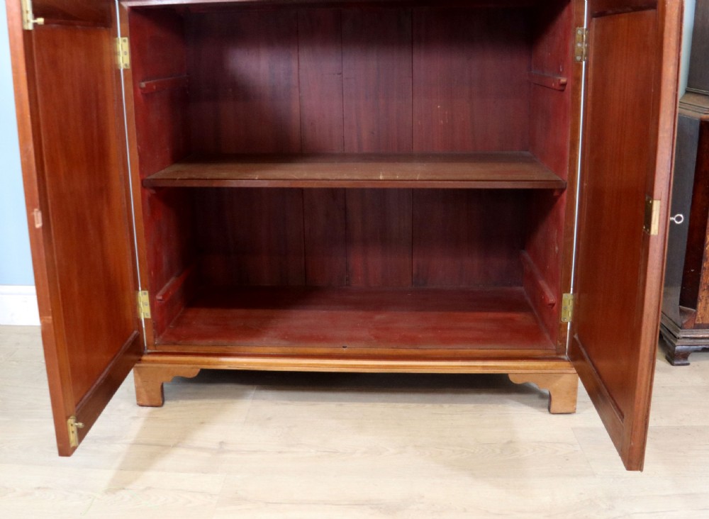 A superb example of a quality Georgian mahogany bookcase cabinet.  View XV