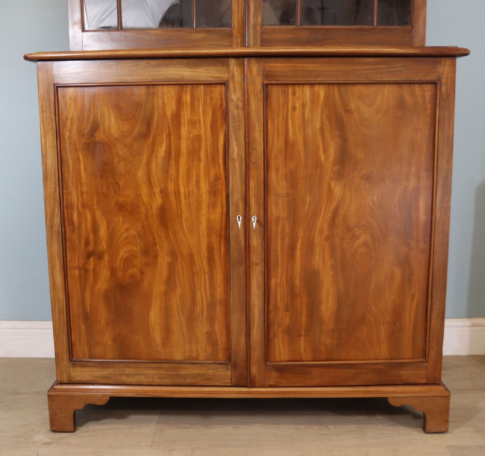 A superb example of a quality Georgian mahogany bookcase cabinet.  View XVII