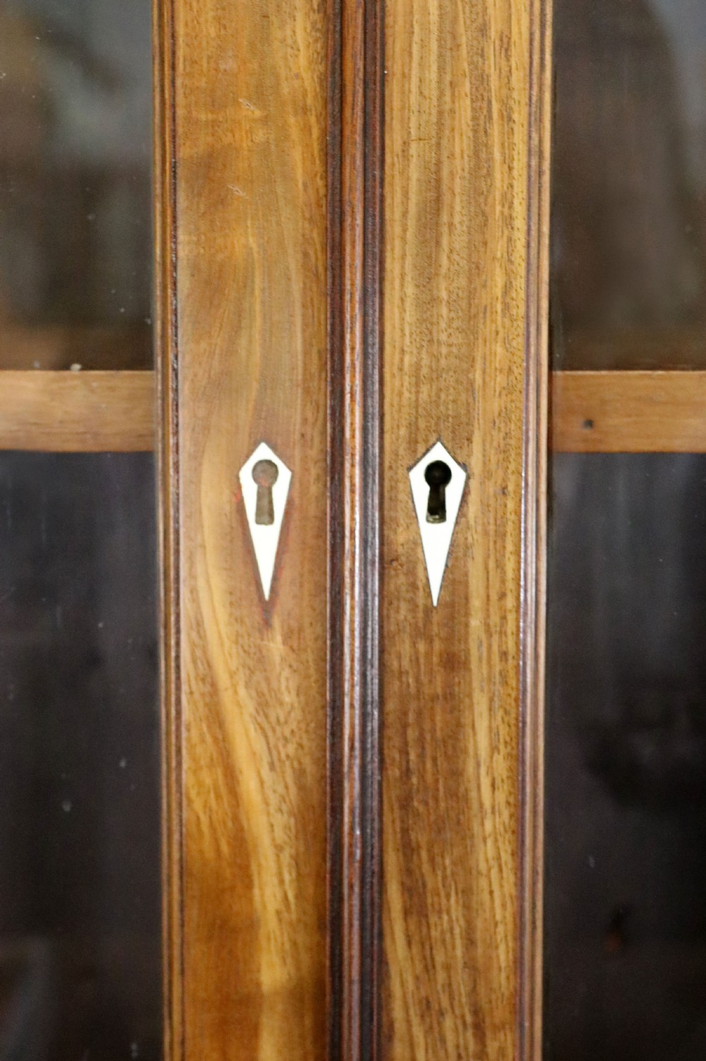 A superb example of a quality Georgian mahogany bookcase cabinet.  View XIX