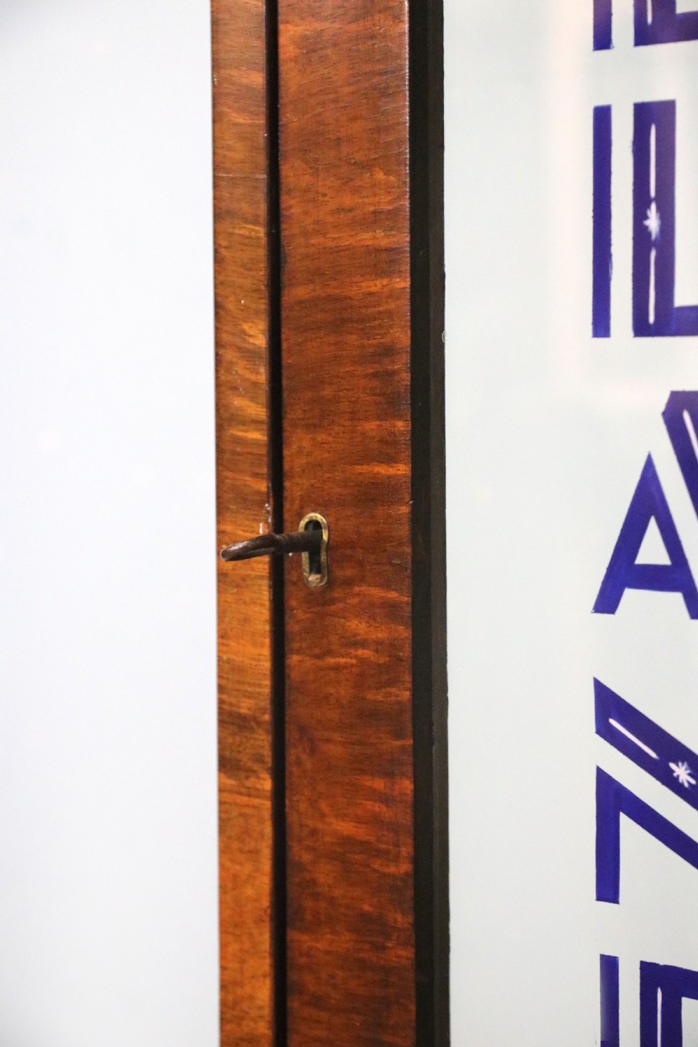 A lovely 1930’s walnut veneered display cabinet  View XVII
