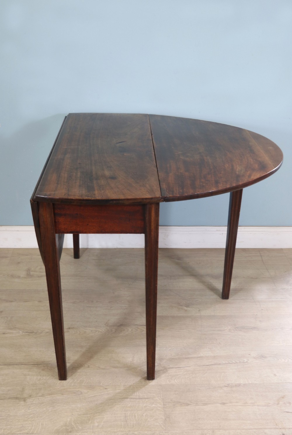 George III mahogany dropleaf table of oval form View VIII