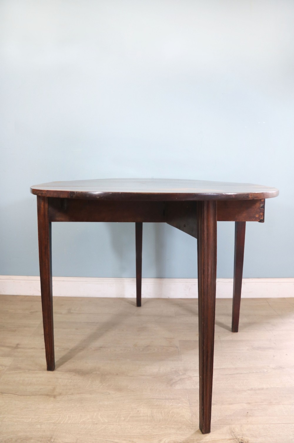 George III mahogany dropleaf table of oval form View IX