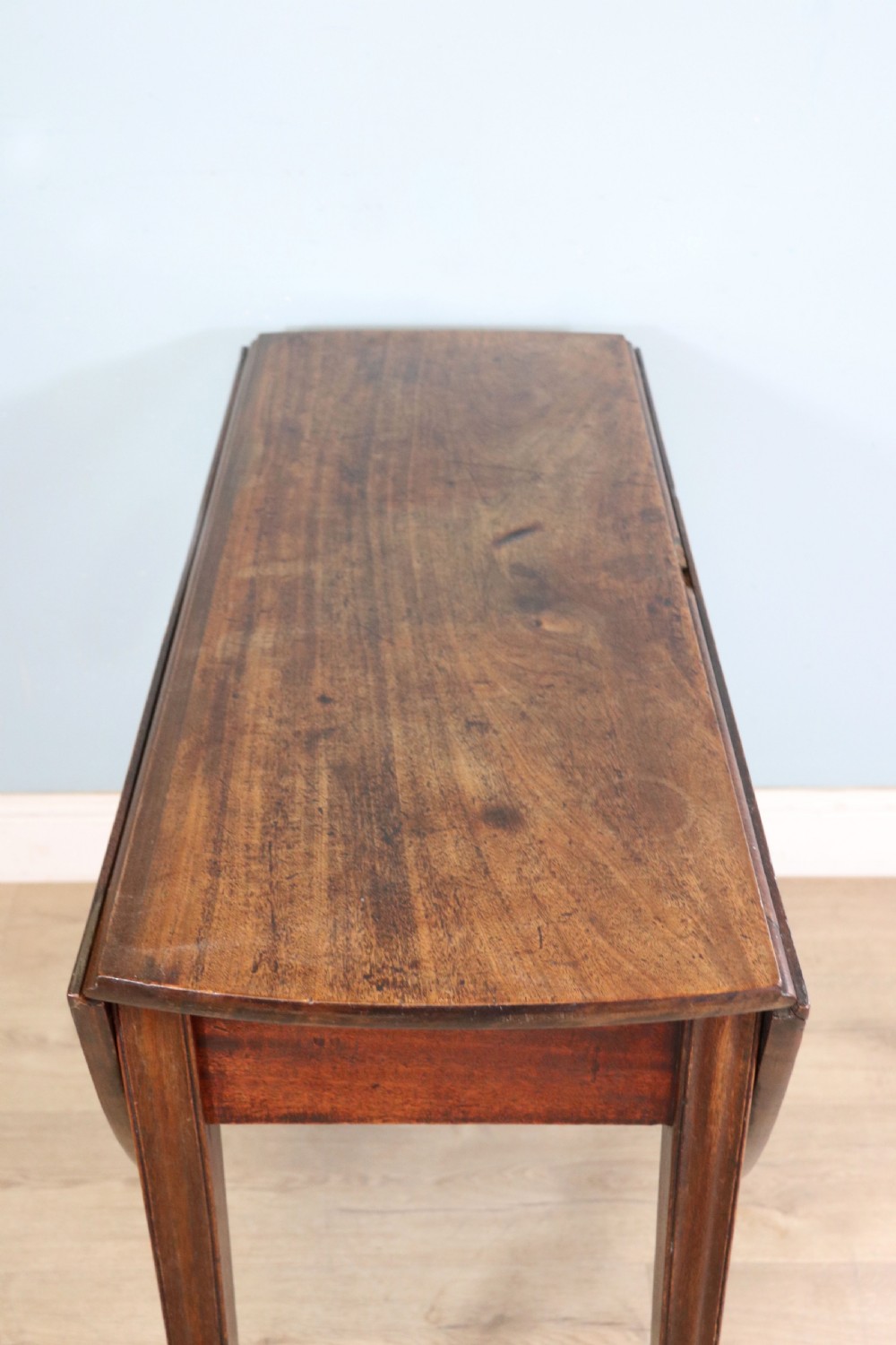 George III mahogany dropleaf table of oval form View XIII