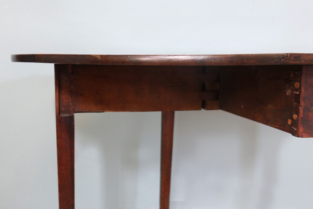 George III mahogany dropleaf table of oval form View XVI