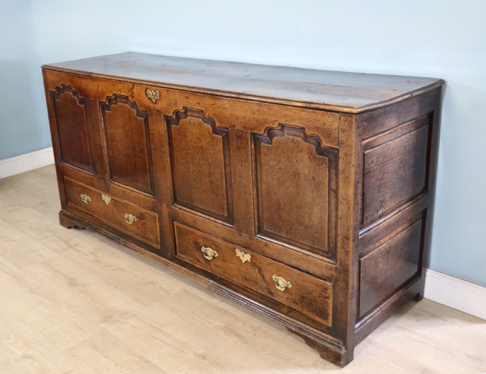 A very fine 18th century oak mule chest View V