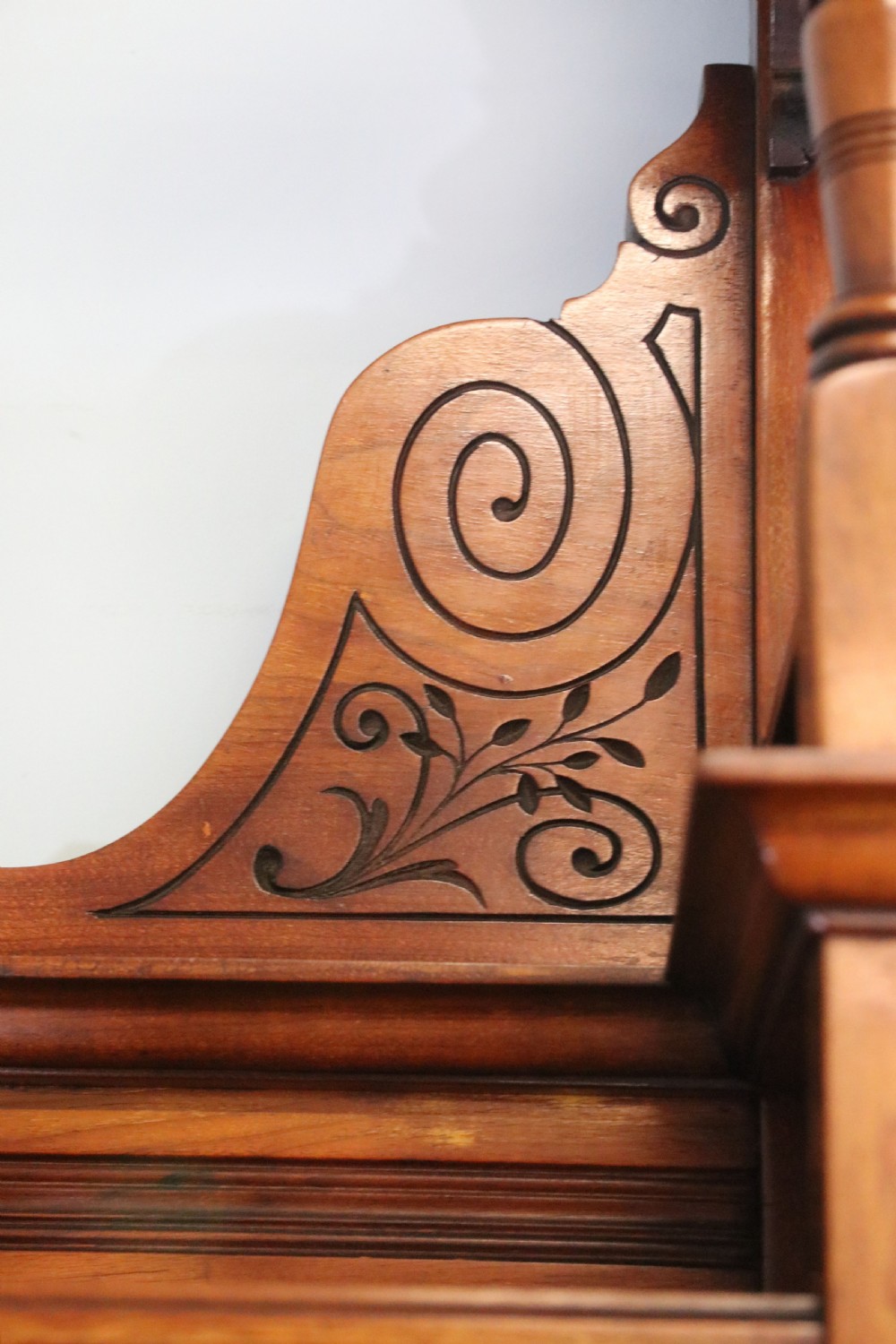 A late Victorian carved wood side cabinet featuring an ornate upper tier with multiple bevelled mirror plates, spindled galleries, glass-front doors, and carved lower cupboards. View XVI