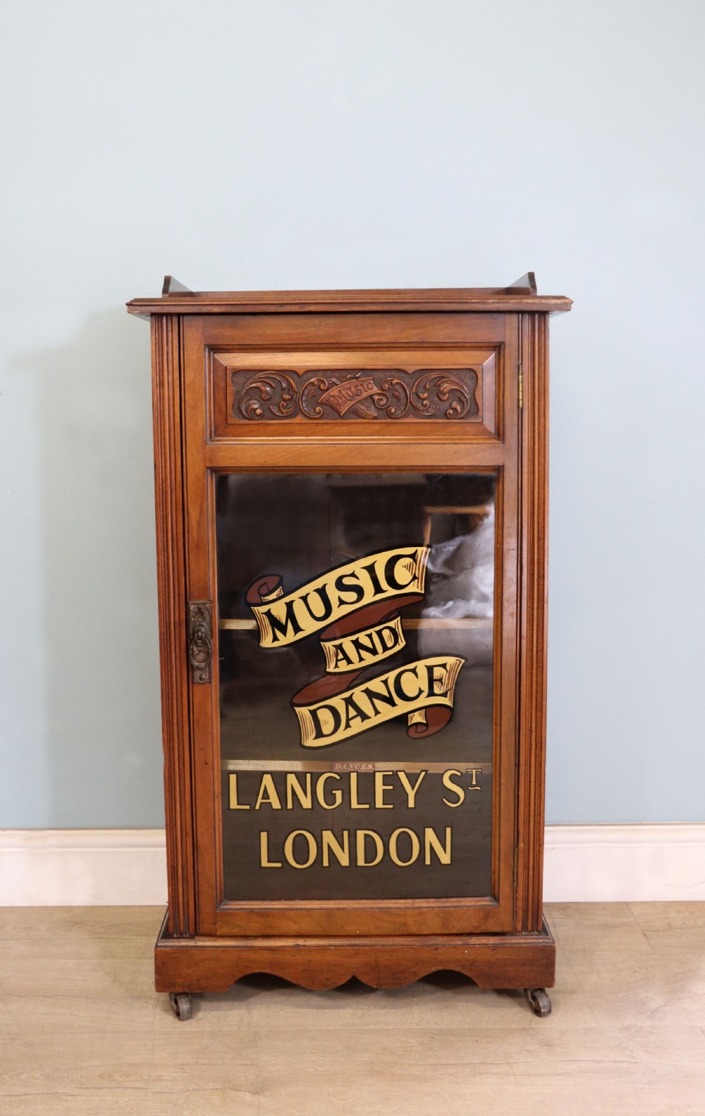  Late 19th century American walnut music cabinet. View II