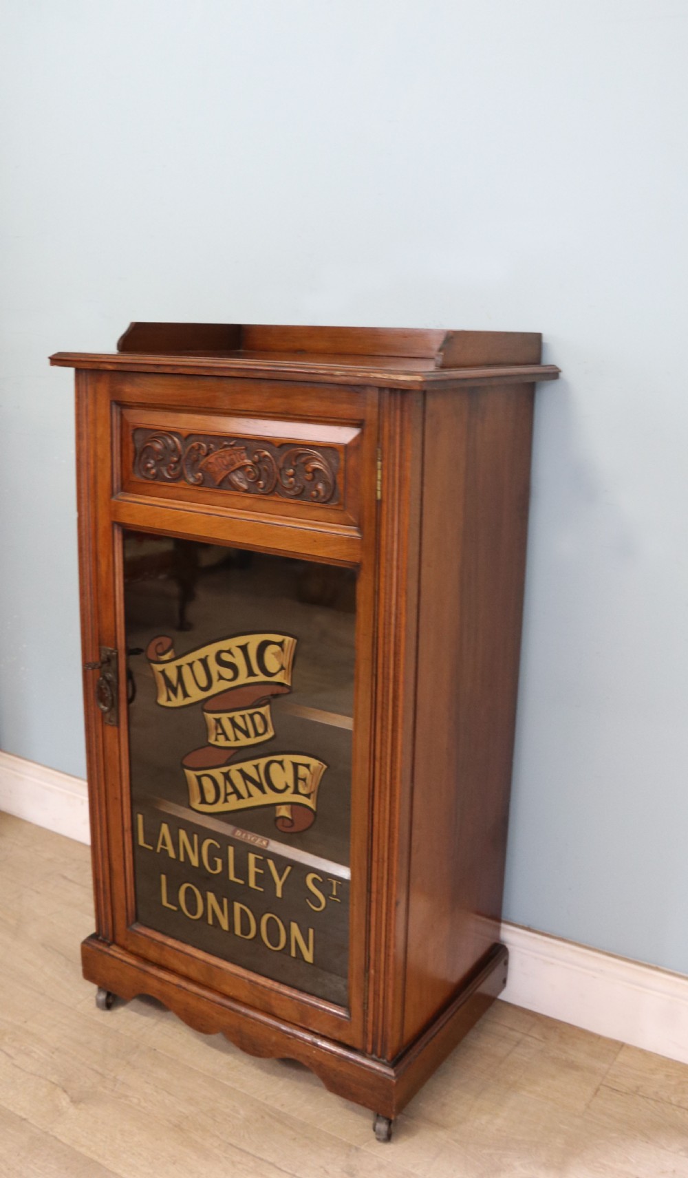  Late 19th century American walnut music cabinet. View III