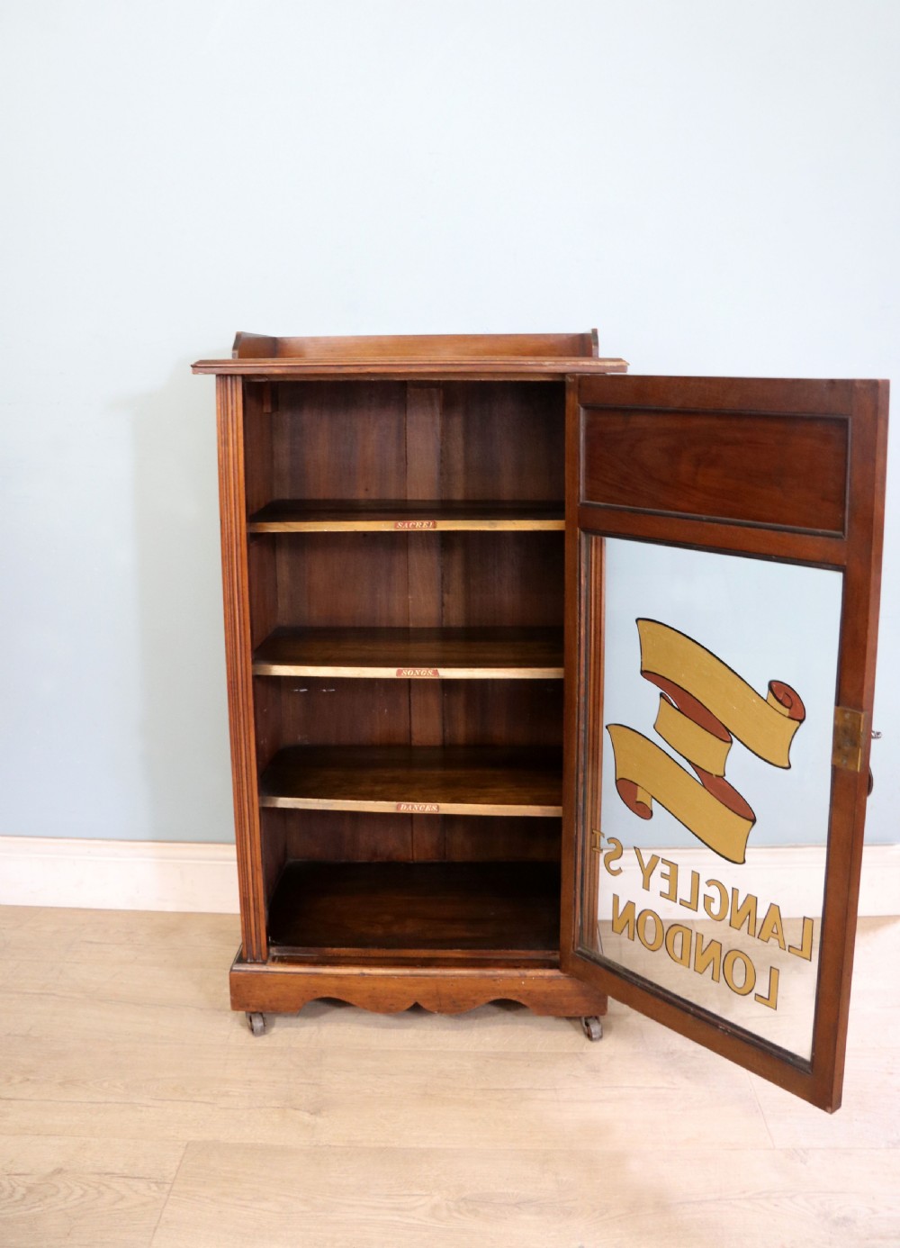 Late 19th century American walnut music cabinet. View IV