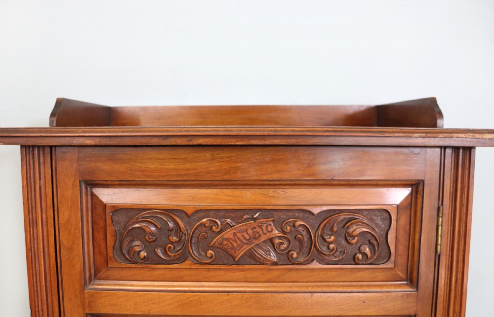  Late 19th century American walnut music cabinet. View VII
