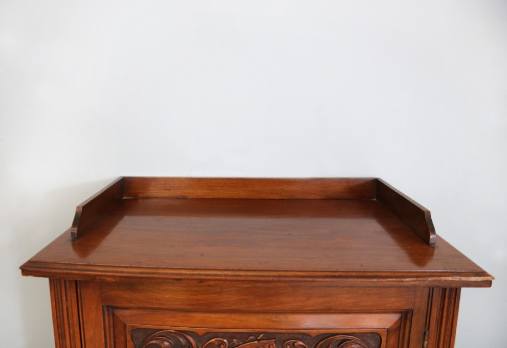  Late 19th century American walnut music cabinet. View VIII