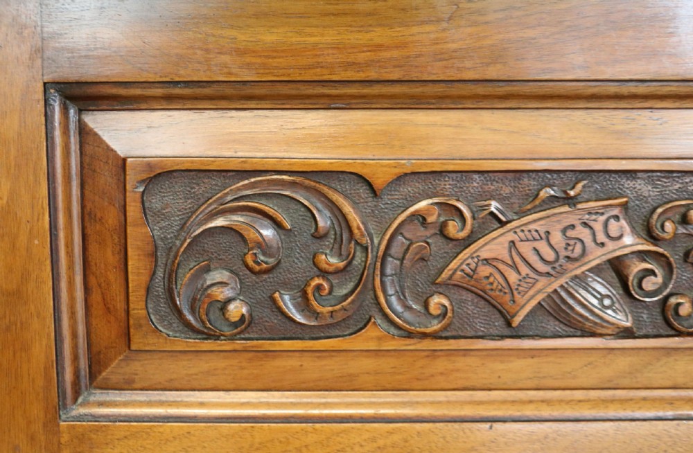  Late 19th century American walnut music cabinet. View XI